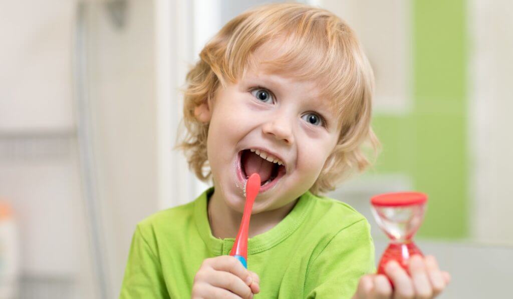 Child smiling at the pediatric dentist